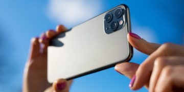 closeup of hands holding smartphone