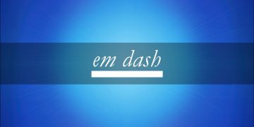 The word "em dash" on a blue background