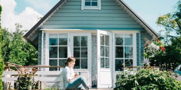 Cranes work on an urban housing project in development.