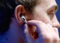 One third-generation AirPod inside an ear.