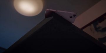 iPhone about to fall off of a table