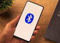 The Bluetooth logo on a smartphone.