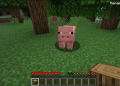 Minecraft pig with a wooden block in hand.