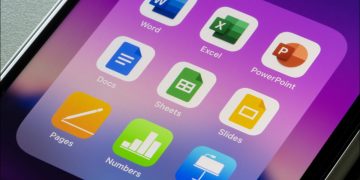 An iPhone screen showing various Microsoft Office and Apple productivity apps together.