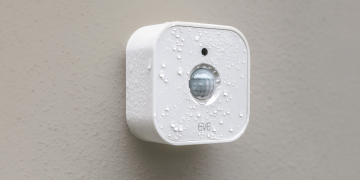 The second-gen Eve Motion sensor sprinkled with water.