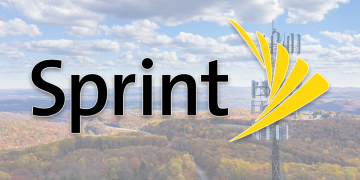 The Sprint logo over an open pasture and a cell tower.