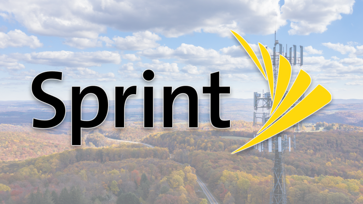 The Sprint logo over an open pasture and a cell tower.