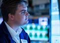 Stock futures slide after big gain in prior session as investors brace for more earnings reports