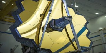 The main mirror assembly of the James Webb Space Telescope at the Northrop Grumman facility in Redondo Beach, California. The main mirror measures more than 21 feet (6.5 metres) in diameter and is made up of 18 smaller, hexagonal-shaped mirrors. AP