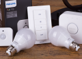 Two Philips Hue bulbs with a smart dimmer, smart sensor, and Hue Bridge.