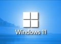 A fresh Windows 11 logo on a blue landscape