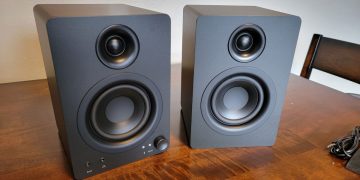 MonoPrice DT-3BT desktop speakers sitting on table