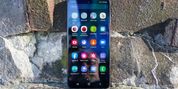 Samsung Galaxy S21 FE front panel on rocks