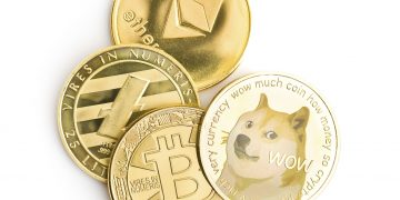Dogecoin, litecoin, ethereum and bitcoin isolated on white background.