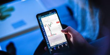 Trader uses smart phone to purchase Bitcoin