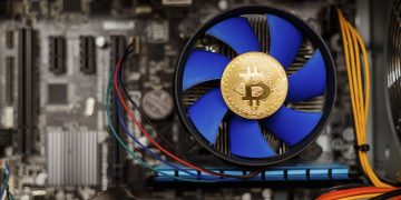 Golden Bitcoin money on computer