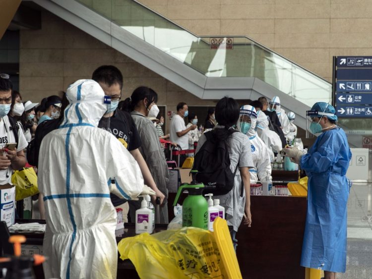 China drops some COVID rules for travellers but keeps quarantine | Business and Economy News