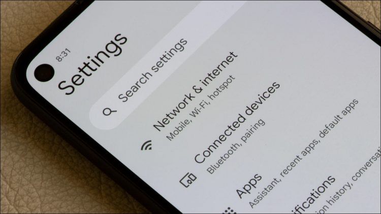 An Android Pixel 4a phone with the Settings menu open and the "Network & Internet" option in focus.