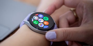 The Galaxy Watch 5 screen showing third-party apps like Google Assistant, Spotify, Strava and Calm