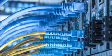 Photo of fiber networking cables connected to a server