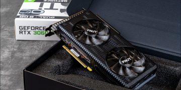 A Palit NVIDIA Geforce RTX 3060 Ti graphics card in an open box against dark background.