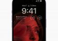 iPhone 14 Pro's always-on display dims the wallpaper and shows the Lock Screen widgets.