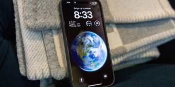 iPhone 14 Pro on a throw