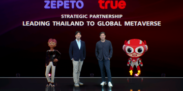 Officials of Zepeto and True stand on stage with virtual avatars