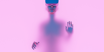 a woman wearing VR glasses immersed in backlit diffuse liquid