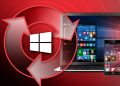 Microsoft Windows update cycle arrows with overlay a laptop and mobile phone.
