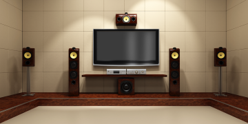 A home theater with surround sound speakers.