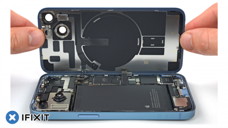 The iPhone 14 opened from the back by iFixit.