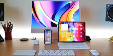 An iMac, iPad, iPhone, AirPods, and AirPods Pro