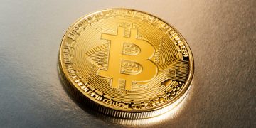 Bitcoin on a plain background. Markets: Bitcoin, Ether, Cardano, XRP fall; BNB gains on Binance Twitter investment