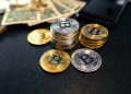 Bitcoin coins and money on the business desk