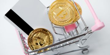 Cryptocurrency and payments card in shopping cart oogle cloud coinbase