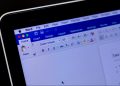 Word document open on a laptop computer