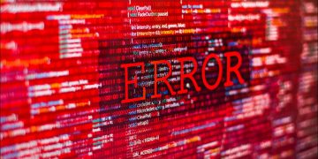 Graphic showing a red error message overlayed on computer code