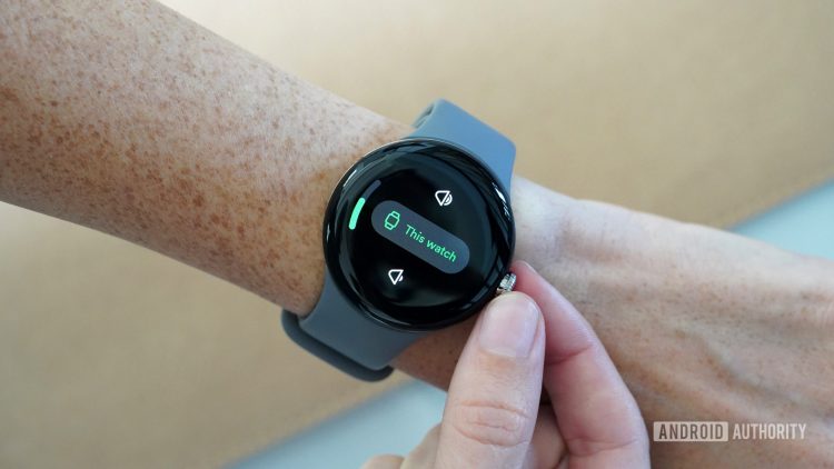 A user adjusts the volume on their Google Pixel Watch.