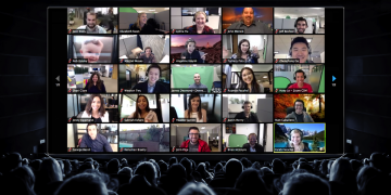 A packed movie theater watching a Zoom call.