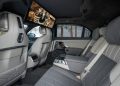 Interior back seat inside of the 2022 BMW i7 with a smart display installed.