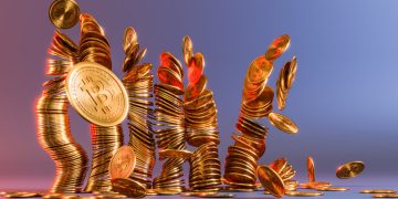 Cryptocurrency Bitcoin golden coins spilling on the table.