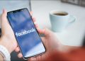 Facebook logo on a smartphone