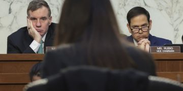 Sen. Mark Warner and Sen. Marco Rubio at a hearing.