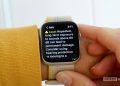 An Apple Watch SE 2 user reviews information in the Noise app.